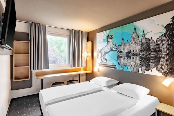 Ropa de cama de alta calidad, escritorio, insonorización y wifi gratis