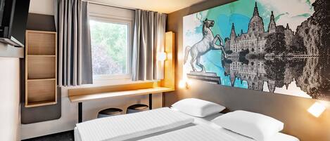 A hotel room with a bed, a desk, a chair, a shelf, and a large window with curtains.