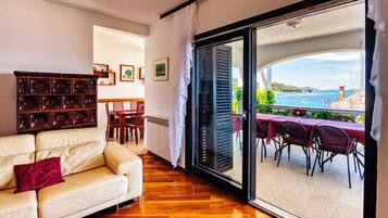 Family House | Living area | 80-cm TV with cable channels