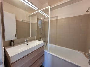 Hair dryer, bathrobes, towels