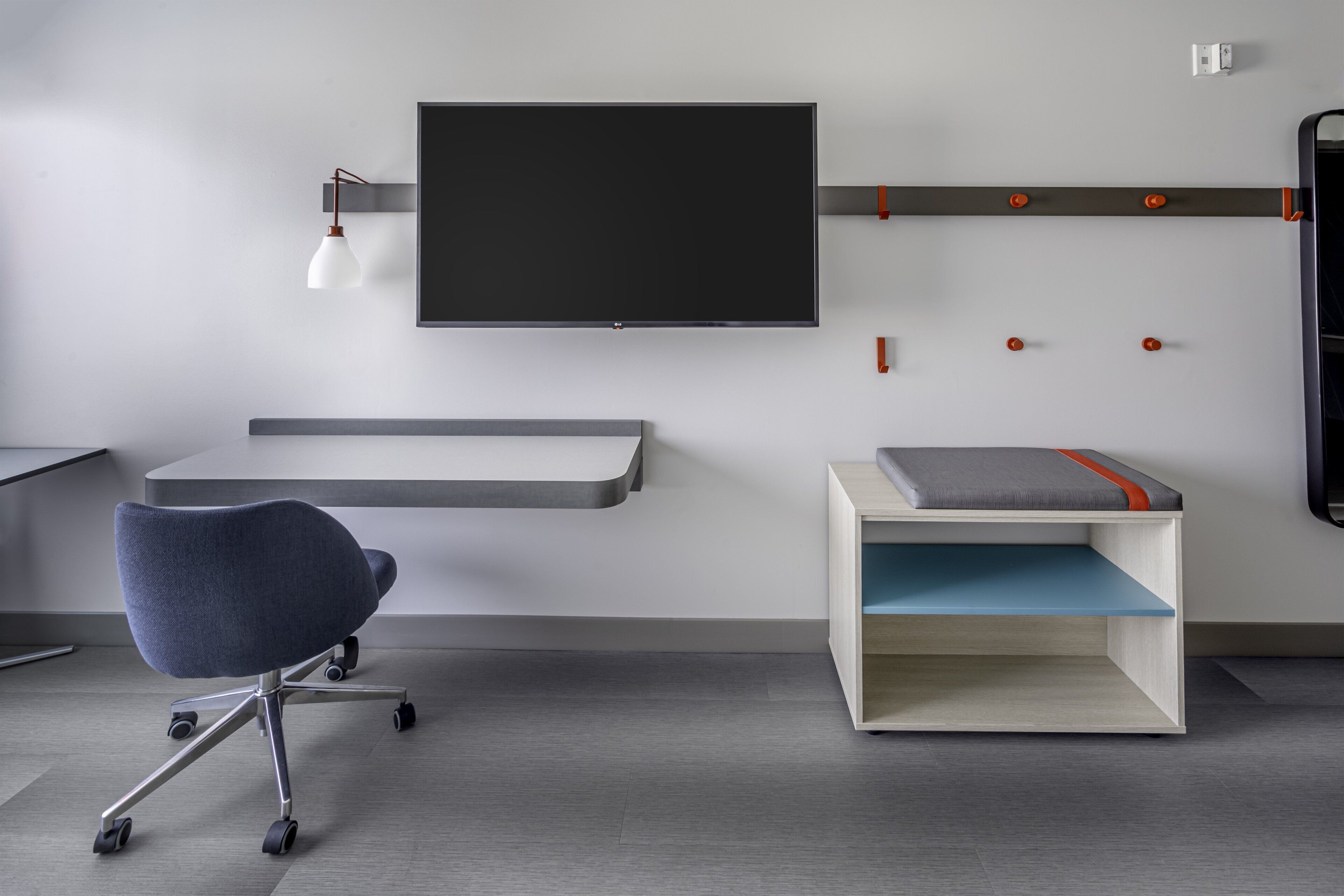 desk, laptop workspace, blackout curtains, iron/ironing board