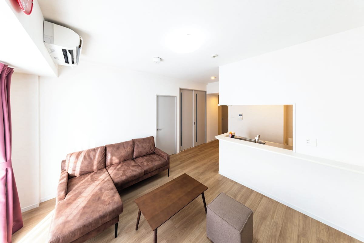 Comfort Apartment | Living area | Flat-screen TV