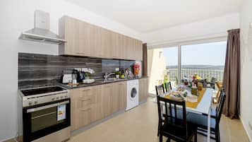 Superior Apartment | Private kitchen | Full-sized fridge, microwave, oven, stovetop