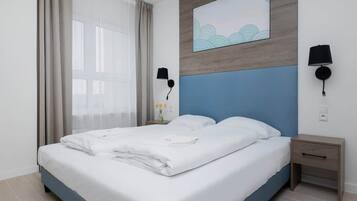 1 habitación, tabla de planchar con plancha, wifi y ropa de cama