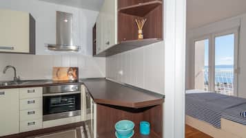 Standard Apartment, 1 Bedroom, Sea View, Sea Facing | Private kitchen | Full-size fridge, oven, stovetop, dishwasher