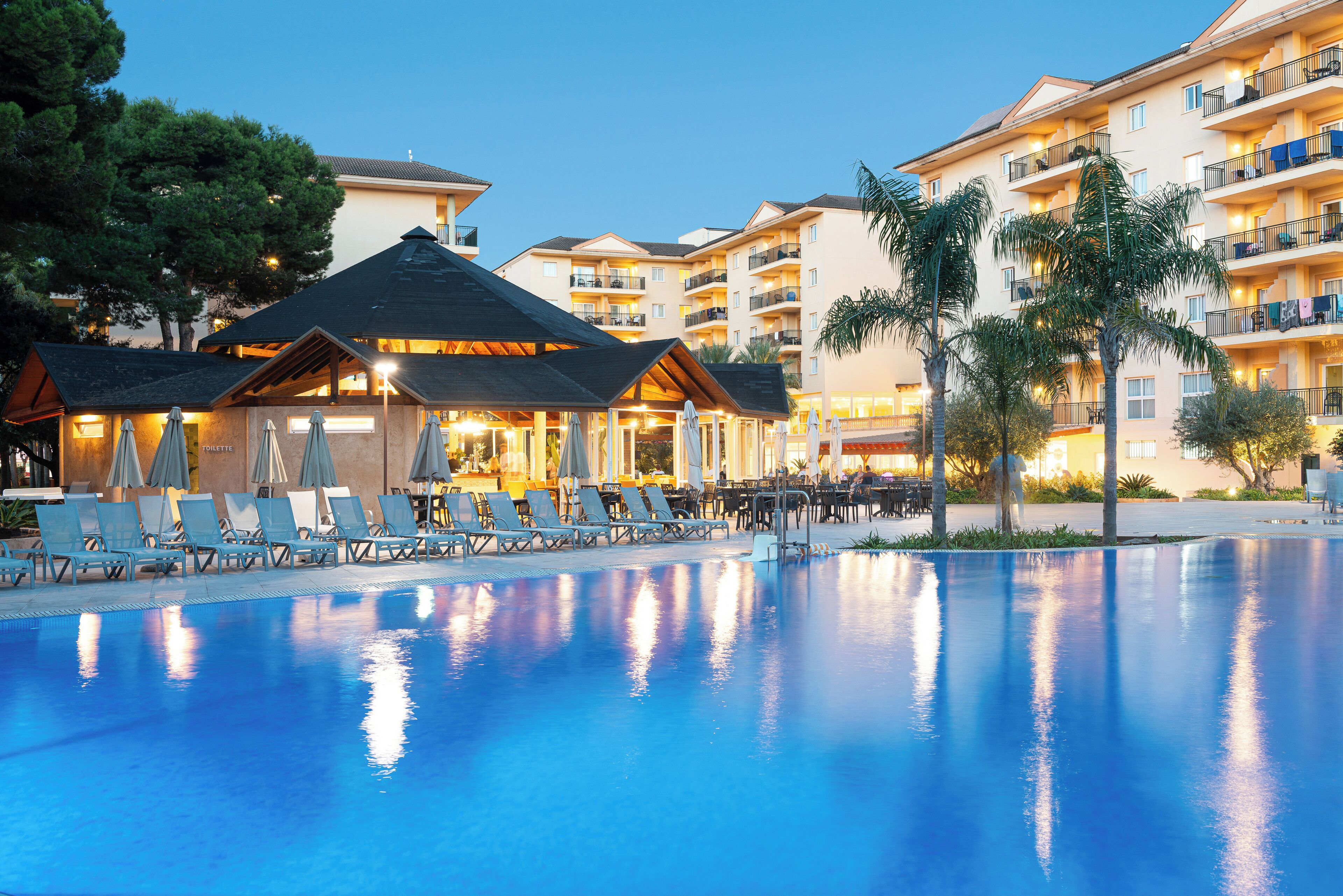 Indoor pool, pool umbrellas, pool loungers