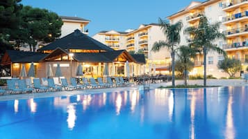 Indoor pool, pool umbrellas, pool loungers