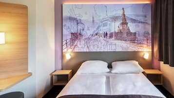 Een bureau, geluiddichte muren, gratis wifi, beddengoed