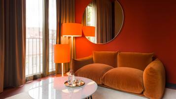 LU Suite | Living area | 40-inch flat-screen TV with satellite channels, TV, toys