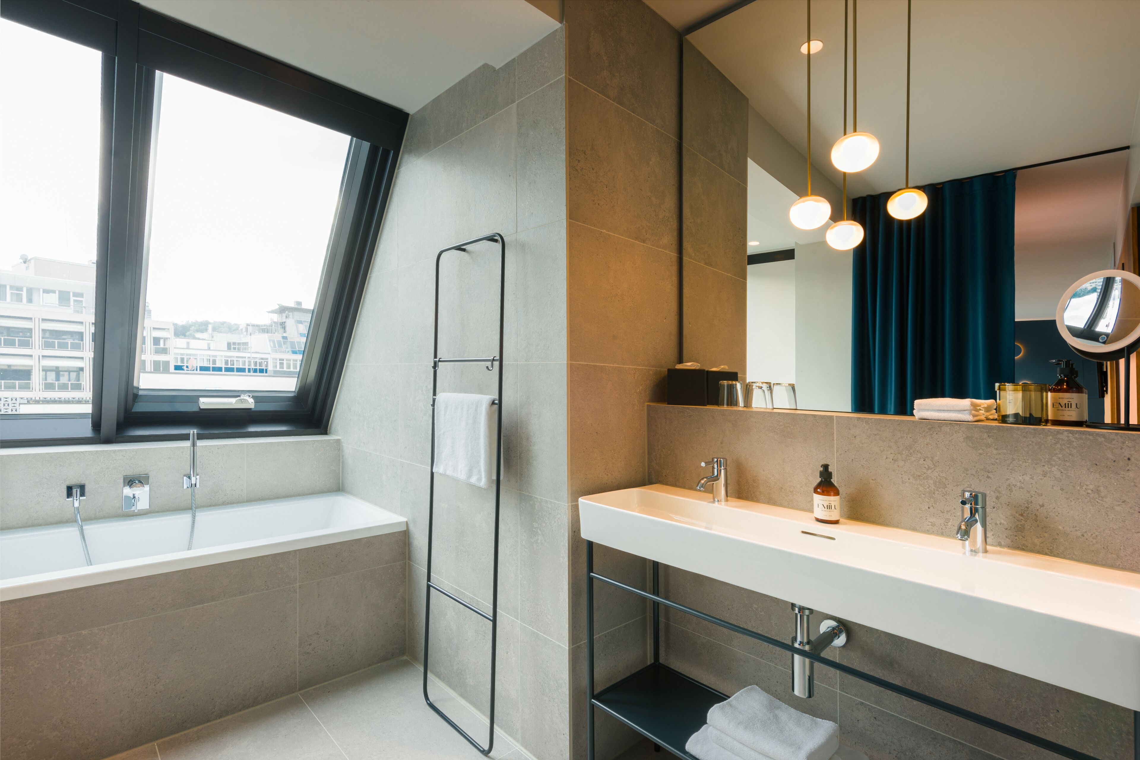 emi suite | bathroom | shower, rainfall showerhead, free toiletries, hair dryer