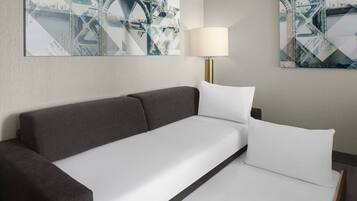 Desk, laptop workspace, blackout drapes, iron/ironing board