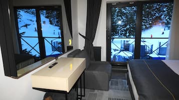 Ropa de cama de alta calidad, minibar, caja fuerte