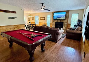 Smart TV, fireplace, books
