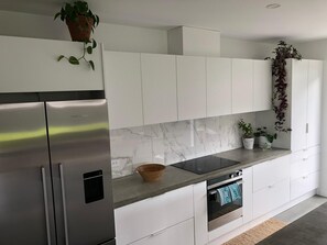 Fridge, toaster, cookware/dishes/utensils