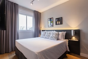 Suite estudio Deluxe, 2 habitaciones | Ropa de cama de alta calidad y camas con pillow-top
