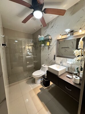 Bathtub, hair dryer, towels