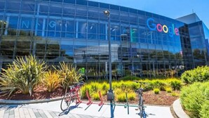 A modern building with a glass facade and the Google logo. - Luxe Studio Getaway in Mountain View Near Google! (Mountain View)
