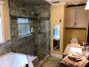 Bathtub, jetted tub, towels, soap
