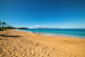 On the beach, sun loungers, beach towels - Steps to Kaanapali Beach, garden studio, king bed (Lahaina)