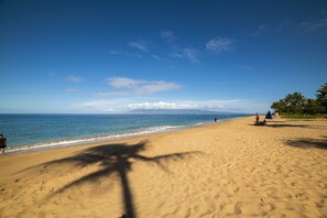 On the beach, sun-loungers, beach towels