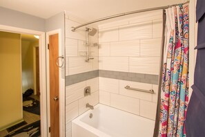 Combined shower/tub, hair dryer, towels, soap