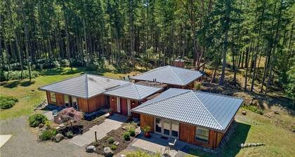 Luxury four bedroom home on sixteen acres of wooded privacy.