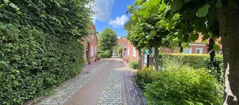 Vacation apartment "Nordlicht" with large garden in the heart of Pilsum