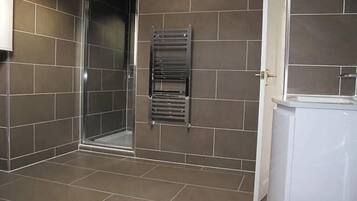 Bathtub, hair dryer, towels