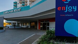 The entrance to Olympia Park Resort with a prominent 'Enjoy Hotels & Resorts' sign. - Enjoy Olimpia Park Resort (SP)