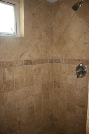 Bathtub, jetted bath, hair dryer, towels