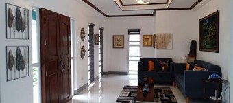 House & Swimming Pool on a Hill