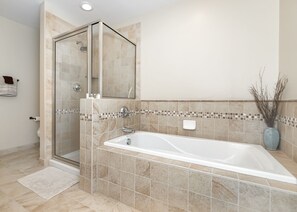 Combined shower/tub, hair dryer, towels, soap