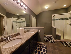Combined shower/tub, hair dryer, towels, soap