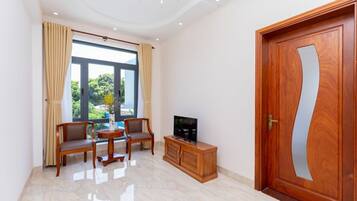 Tran Duy Villa | Living room | TV, ping pong
