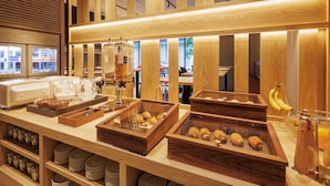 A breakfast buffet with various food items and utensils. - the b ginza (Tokyo)