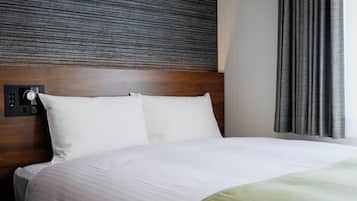Down comforters, desk, blackout drapes, soundproofing