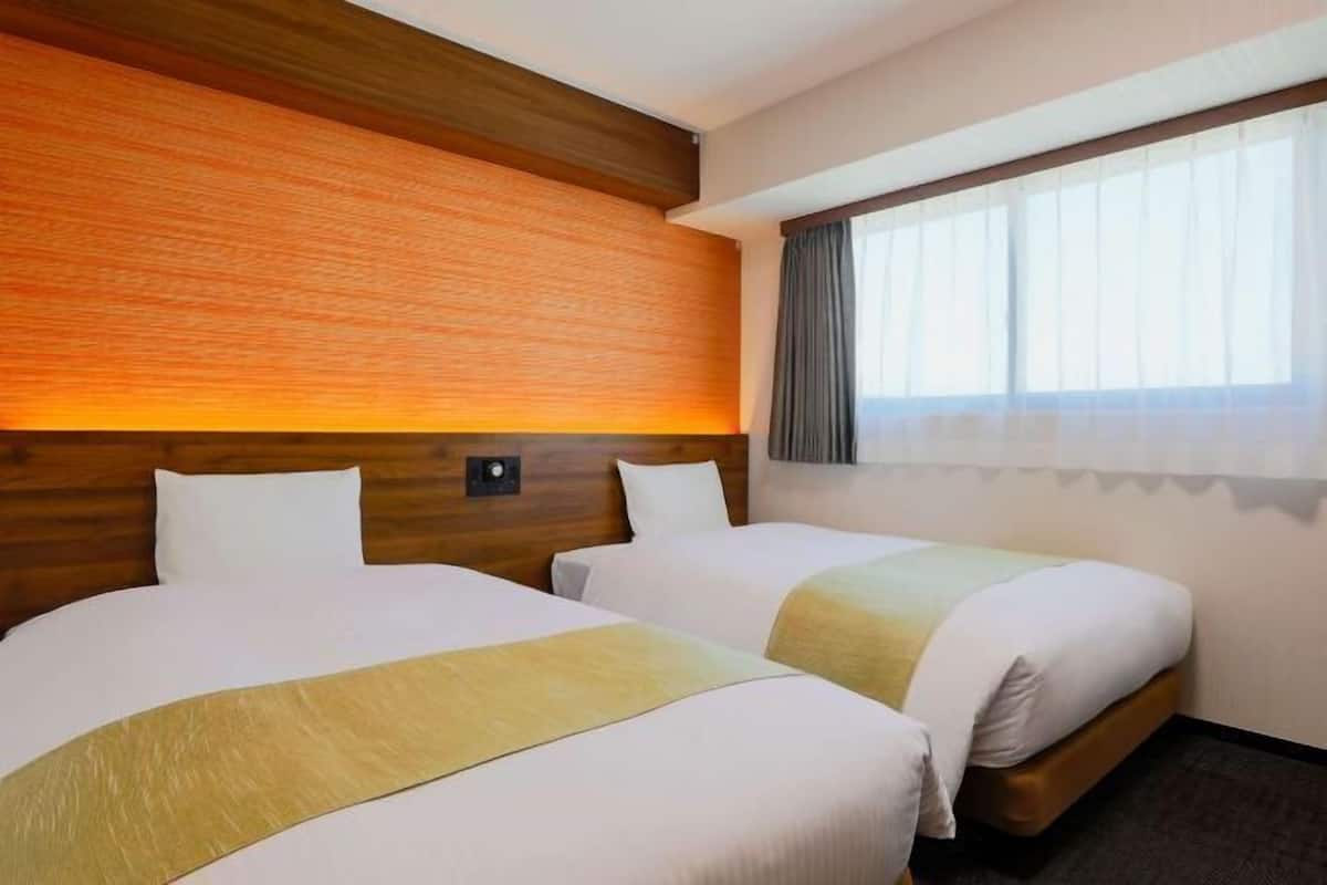 Down comforters, desk, blackout drapes, soundproofing