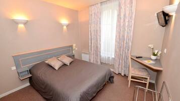 Desk, free WiFi, bed sheets