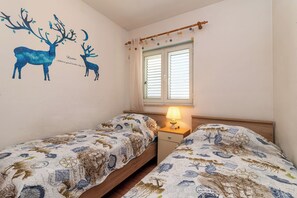 2 chambres, fer et planche à repasser, accès au Wi-Fi (inclus)