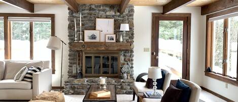 TV, fireplace, books, music library