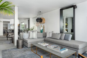 Luxury Apartment | Living room | 45-inch flat-screen TV with cable channels, TV - Ocean View Drive 119B (Cape Town)