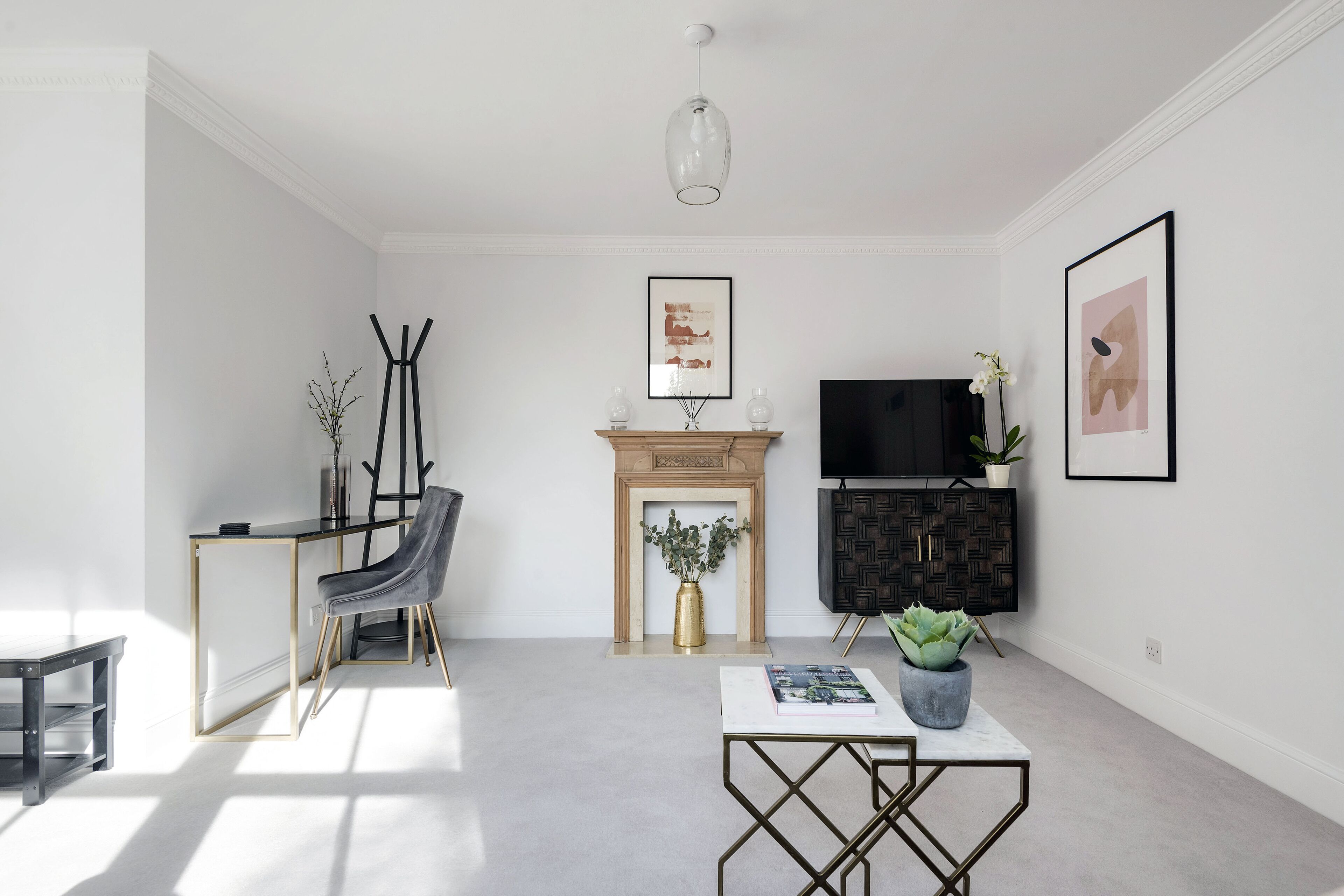 The Wellington Suite | Living room | 24-inch Smart TV with cable channels, TV