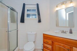 Bathtub, hair dryer, towels