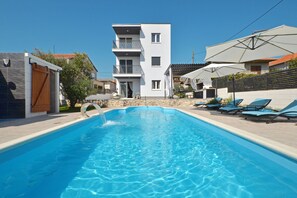 Piscina externa, piscina aquecida