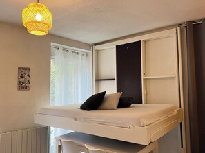 Fer et planche à repasser