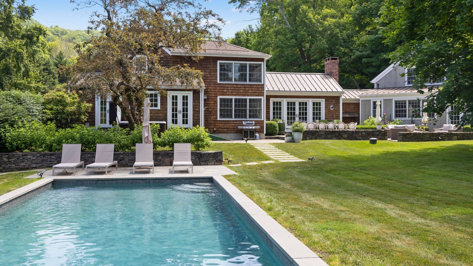 Live the good life in this luxury Lake Waramaug retreat!