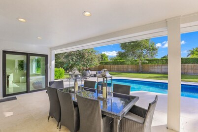 Modern Oasis: Private Beach Access. Minutes from Downtown & Optional Golf Cart