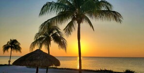 On the beach, sun loungers, beach towels