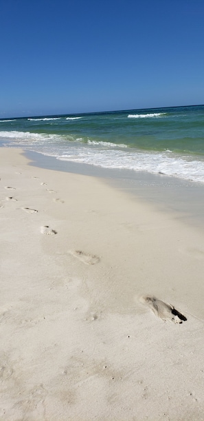 On the beach, sun loungers