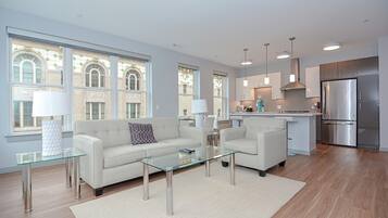 Luxury Apartment, 2 Bedrooms | Living room | 42-inch flat-screen TV with cable channels, TV